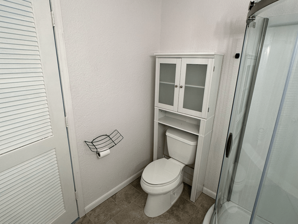 a close up of a shower in a small room